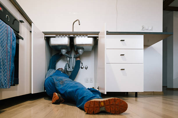 Professional Emergency Plumber technician working in Burton, OH